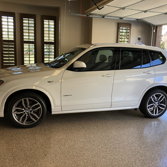 Clean Garage With Epoxy Floor and BMW SUV - Bill from Lantana, Texas