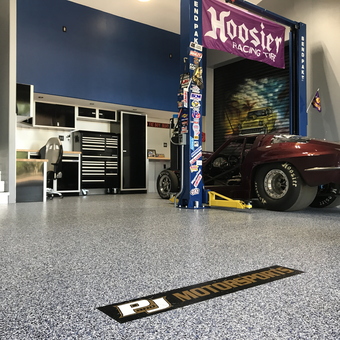 Custom Garage with Car Lift and Tool Cabinets - P&J Motiorsports