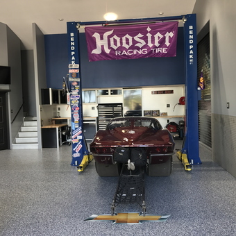 Custom Garage with Car Lift and Cabinets - P&J Motiorsports