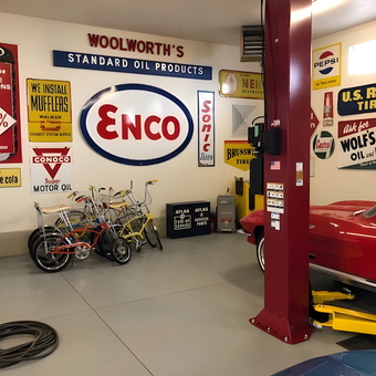 Vintage garage signs, bicycles, and car lift - Jace from West Haven, Utah