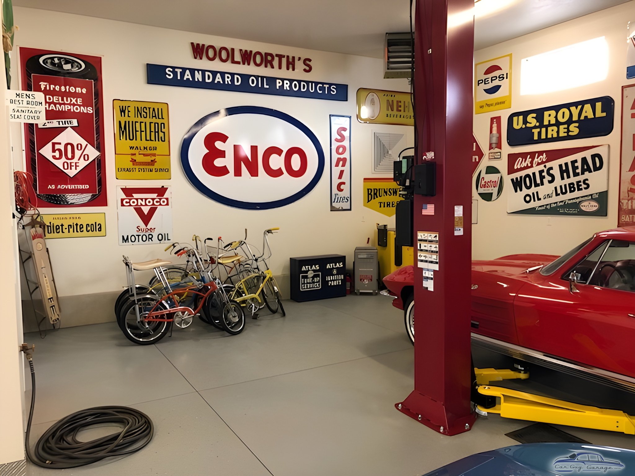 Vintage garage signs, bicycles, and car lift - Jace from West Haven, Utah