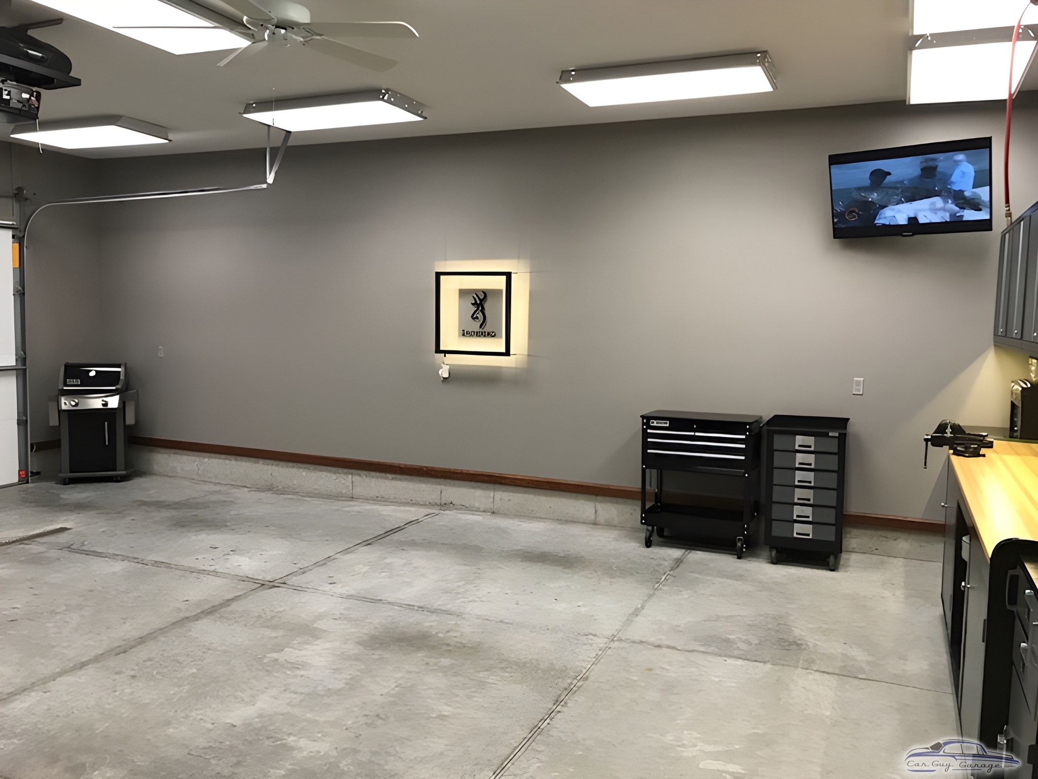 Organized Garage with Tool Cabinets and TV - Roger O from Center Point, IA