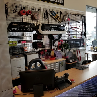 Garage Counter With Accessories and Grille Displays - Kendall Toyota of Bend