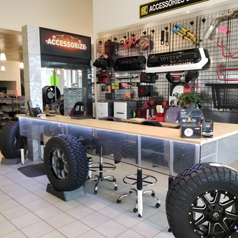 Garage Accessories Display With Tires and Tools - Kendall Toyota of Bend