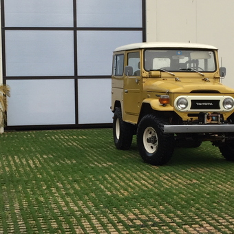 Classic Toyota Land Cruiser and Modern Garage Door - 40's Rock from Dallas, Tx
