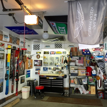 Organized garage with tool chest, shelving, flags, and wall decor - Harbor Master from Gardnerville, Nevada