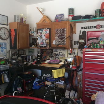 Organized garage workspace with red tool chest and cabinets - Jake from Leland, NC