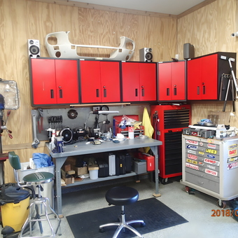 Organized Garage Workspace with Red Cabinets - Mikes Garage from San Antonio, Texas