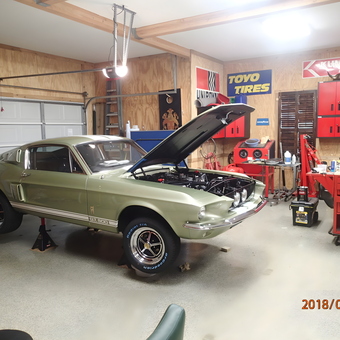 Classic Mustang GT500 in Organized Garage with Red Cabinets - Mikes Garage from San Antonio, Texas