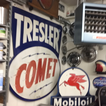 Vintage Garage Signs and Hubcaps Display - Catfish from Alexandria, Kentucky