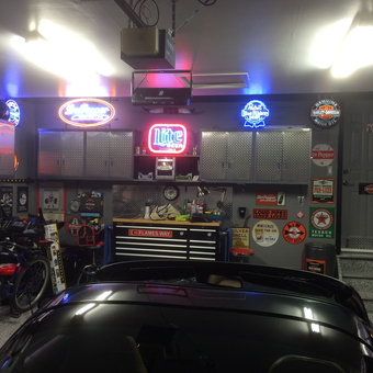 Garage with Diamond Plate Cabinets and Neon Signs - Stump from Calgary, AB