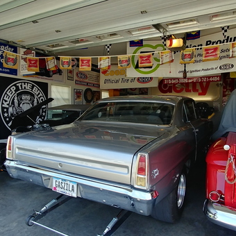 Classic Car Garage with Retro Decor and Signs - Cupcake from Center Point, Ia