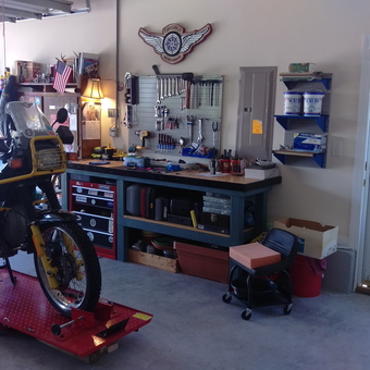 Motorcycle Lift and Tool Storage in Organized Garage - Shade from Murrells Inlet, South Carolina