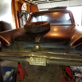 Classic car restoration on jack stands in garage - Penny sessions from Lewiston, ID