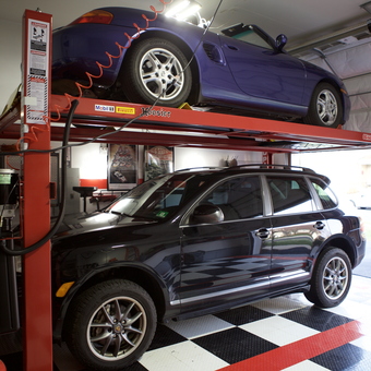 Two-Car Lift with Checkered Flooring - Rudy's Garage from Flemington, NJ