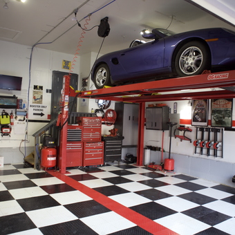 Car Lift, Tool Cabinets, and Checkered Flooring - Rudy's Garage from Flemington, NJ
