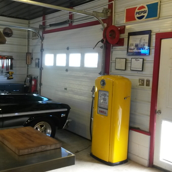 Classic car garage with vintage Shell pump and wall decor - Kyle from Pinetown, North Carolina