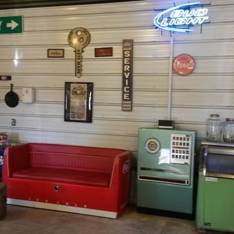 Vintage Garage Decor with Retro Signs and Sofa - Kyle from Pinetown, North Carolina