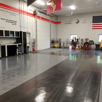 Garage with Modular Cabinets, Tool Storage, and Tile Flooring - Jim's Man Cave