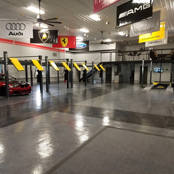 Luxury Garage with Car Lifts and Auto Decor - Jim's Man Cave