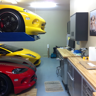 Luxury Sports Cars and Organized Garage Workspace - Thai from Orlando, FL