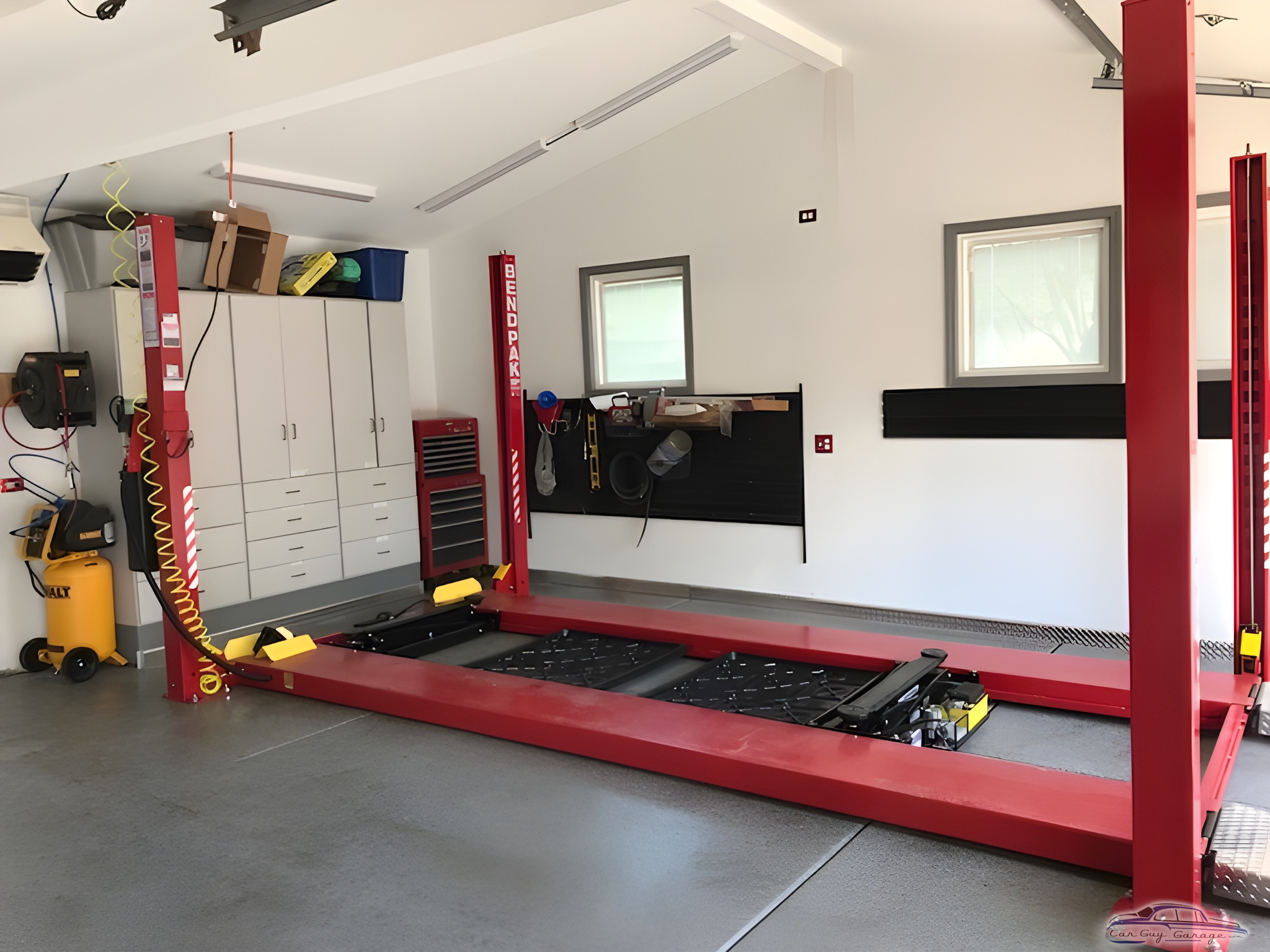 Spacious Garage with Four Post Lift and Storage Cabinets - Alan from Glen Ellyn, IL