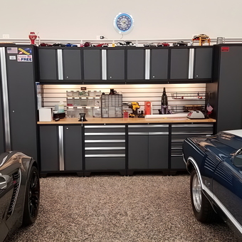 Modern garage with storage cabinets and classic cars - Bill F. from Oyster Bay, NY