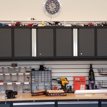Modern garage with black cabinets and workbench - Bill F. from Oyster Bay, NY