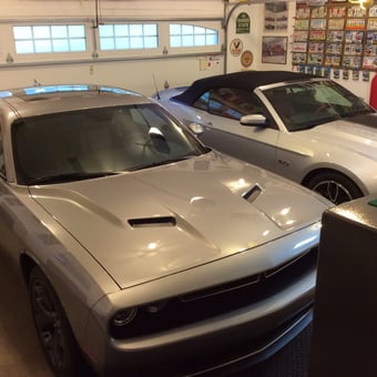 Garage with Silver Muscle Cars and Wall Decor - Dave H from DeMotte, Indiana