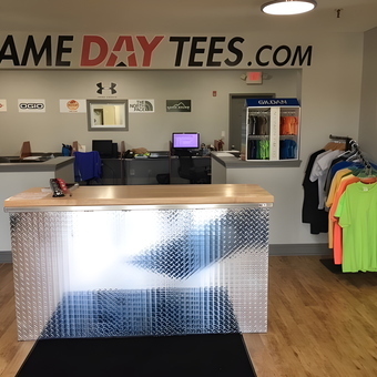 Garage Reception with Diamond Plate Counter - Same Day Tees from Franfort, IL