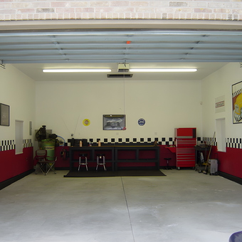 Organized garage with workbench, tool chest, and decor - Mike from Payson, UT