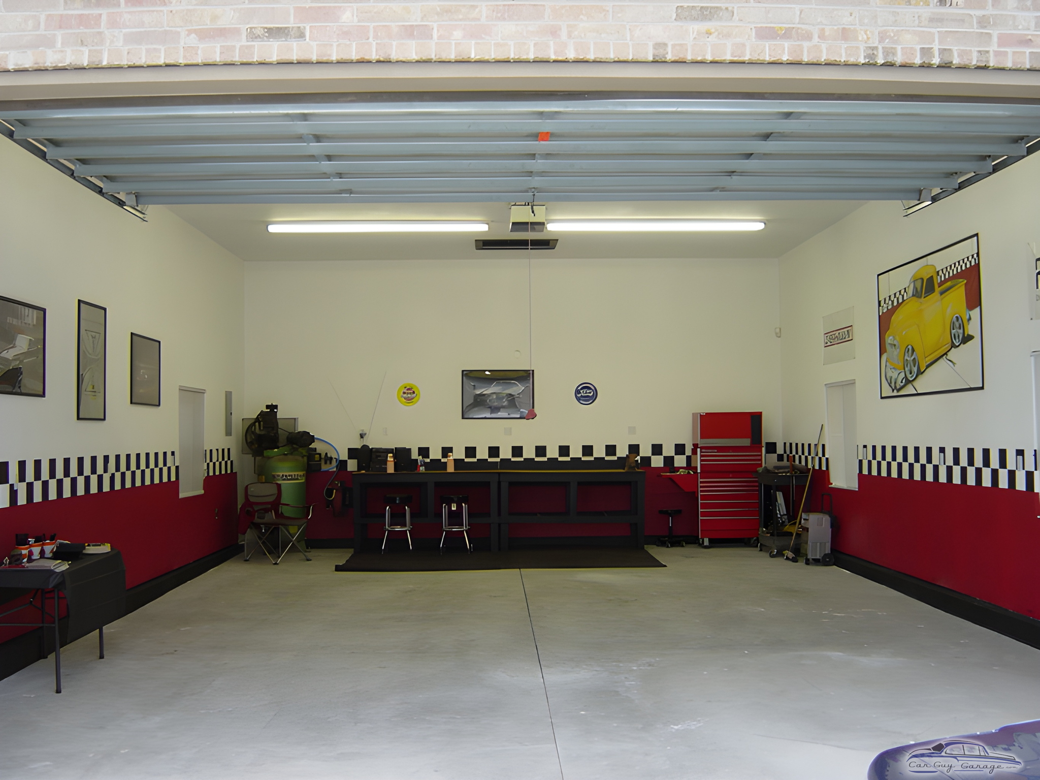 Organized garage with workbench, tool chest, and decor - Mike from Payson, UT