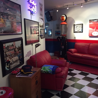 Retro Garage Lounge with Red Sofas and Neon Signs - Tom from Valparaiso, Indiana