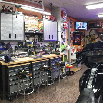 Ultimate Garage with Tool Chest, Cabinets, Neon Signs, and Bar Stools - Anonymous