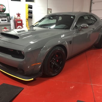 Classic Gas Pumps and Muscle Car in Red Floor Garage - MDB Garages