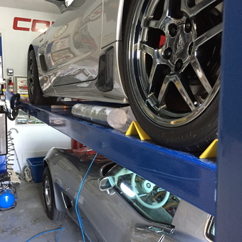 Garage with Car Lift and Corvette Display - Ron Packer from Marine City, Michigan