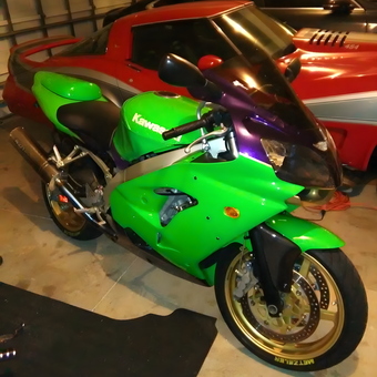 Green Kawasaki Motorcycle and Classic Car in Garage - DaNewt from Tampa, FL