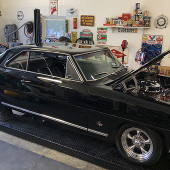 Classic Car on Lift with Vintage Signs - Jason Wolfe from KINGSTON, TN