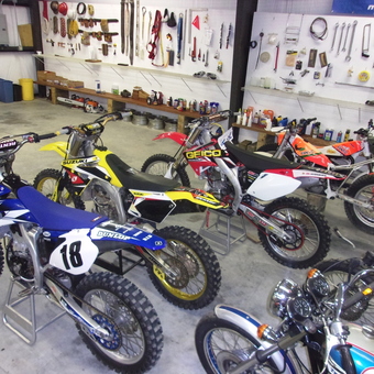 Dirt Bikes, Tools, and Oil Storage in Organized Garage - Lyle from Summerfield, NC