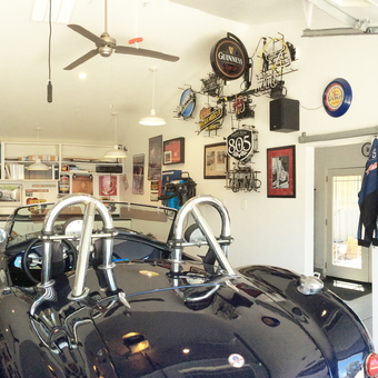 Classic Car Garage with Wall Signs and Bar Stools - Ray