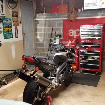 Motorcycle Garage With Tool Chests and Wall Decor - Falcopilot from Jasper, GA