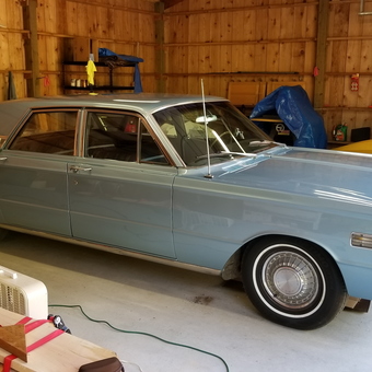 Classic Blue Car in Wooden Garage with Shelving - Eric from Seattle, Washington