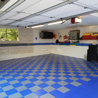 Organized Garage with Blue Tile Flooring and Wall Storage - Jacob Seattle from Edmonds, WA