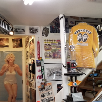 Garage Decor With Racing Posters, Trophies, and Car Parts - Von Hot Rod from Grand Terrace, CA