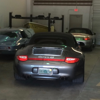 Classic and modern Porsche cars in organized garage - Mike from Indian Rocks Beach, FL