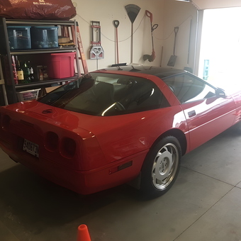 Organized garage with red Corvette and wall tools - Gil Jr from New Windsor, NY