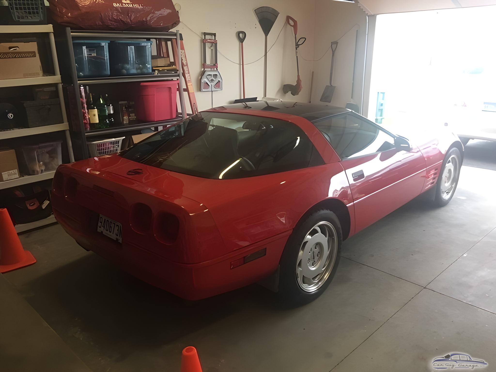 Organized garage with red Corvette and wall tools - Gil Jr from New Windsor, NY