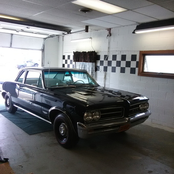 Classic Black Pontiac GTO in Checkered Garage - Patricia Persello from Canton, OH
