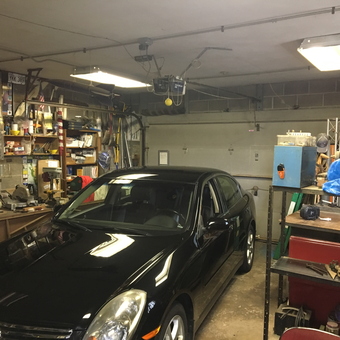 Organized Garage with Workbenches, Shelving, and Tools - firebrick from Park Ridge, Illinois