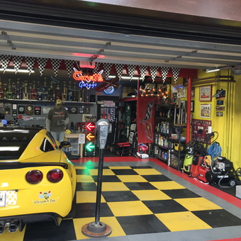Yellow Corvette Garage with Checkered Decor - Skream N' Bee from Cliffside Park, NJ